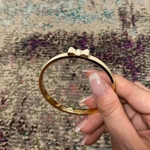 Kate Spade Bow Bangle in Ivory.